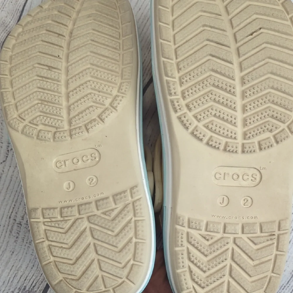 CROCS Kids Classic Clog in Cream with Light Blue Trim